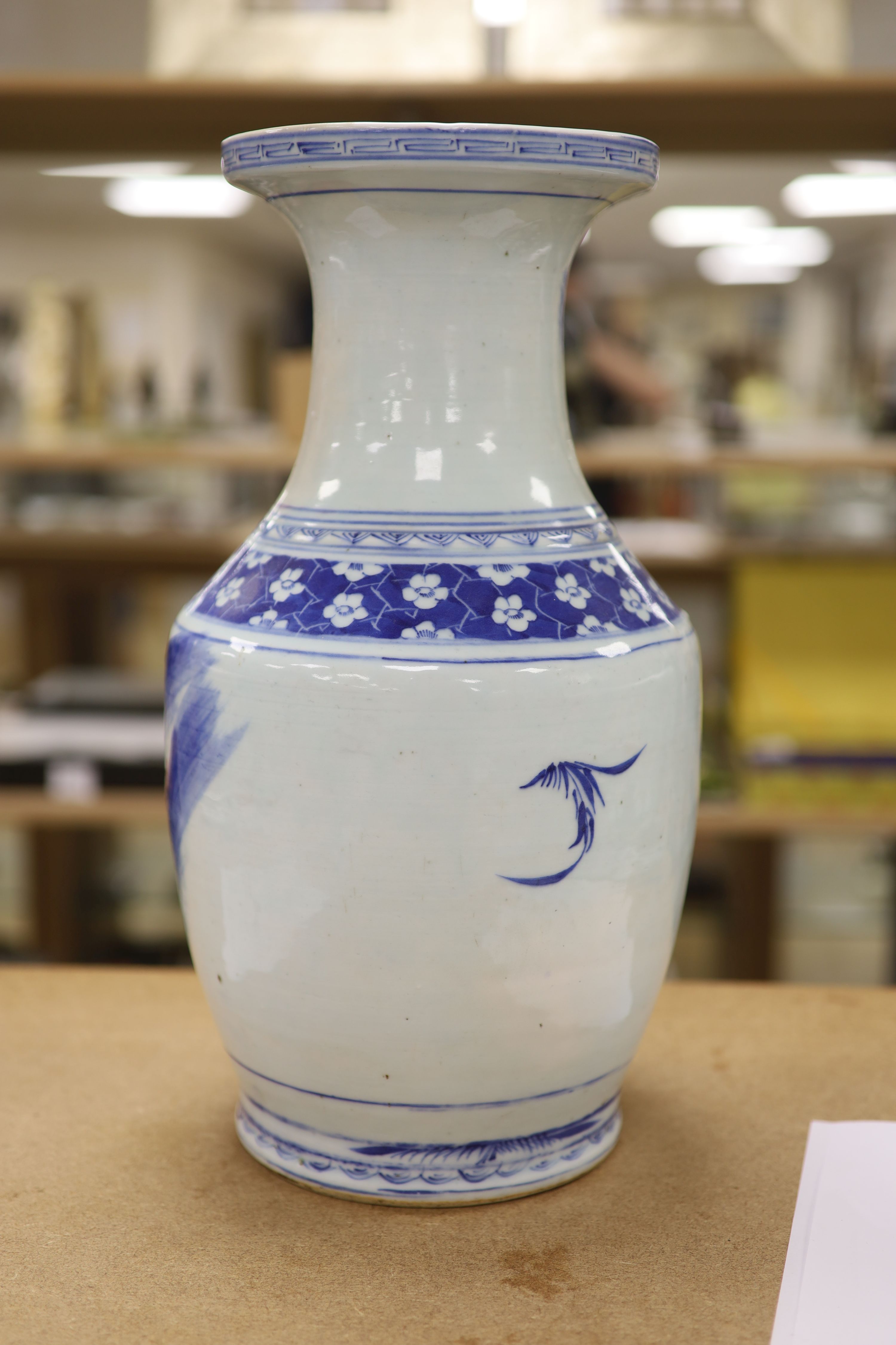 A large Chinese underglaze blue and copper red vase, height 41cm, restored neck